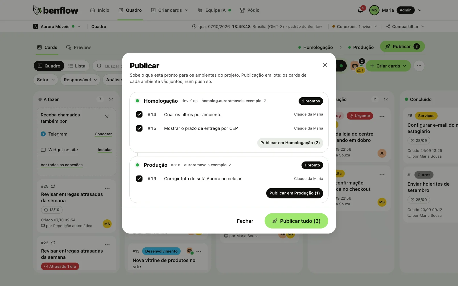 Janela Publicar da Aurora Móveis, Publicação em lote, com Homologação, develop, homolog.auroramoveis.exemplo e 2 prontos, os cards 14 e 15 marcados e Publicar em Homologação (2); embaixo, Produção, main, auroramoveis.exemplo e 1 pronto, o card 19 marcado e Publicar em Produção (1); no pé, Fechar e Publicar tudo (3)