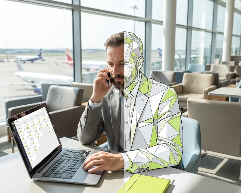 Agency owner in an airport lounge, on the phone, with the laptop showing each client's board, half drawn in facets